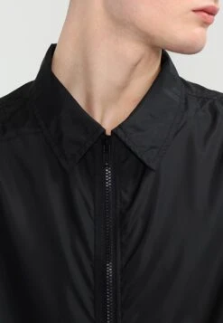 URBAN CLASSICS Coach Coat - Trench - Black -URBAN CLASSICS Soldes Boutique 09034012306348b0ac5b16922c007775